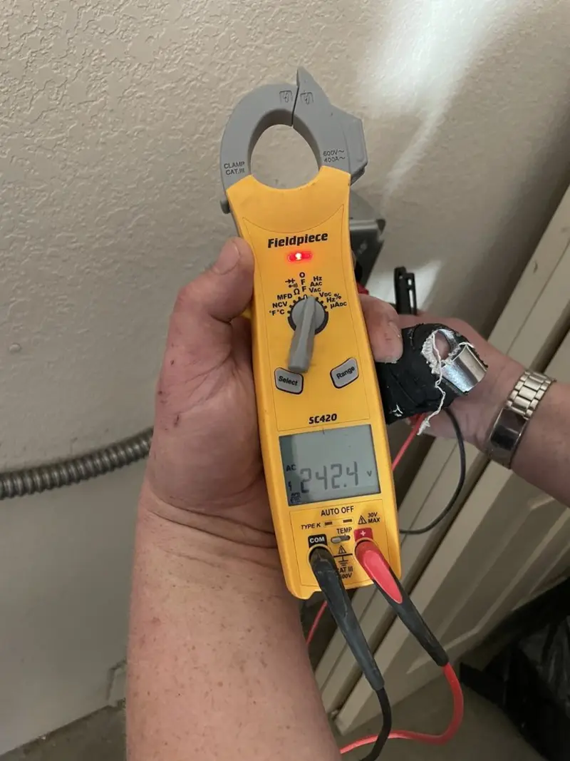 Voltage testing with clamp meter during Circuit Breaker Repair in Fairborn